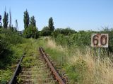 Pohľad od Topoľčianok na odbočku. Ešte pred výhybkou je rýchlosť zvýšená na 60 km/h. 15.7.2006, © Marko Engler