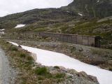 Dřevěné galerie pod jižní hrází jezera Lago Bianco. 5.7.2009 © Jan Přikryl