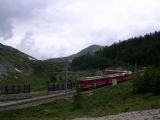 Souprava Bernina expresu nad stanicí Alp Grüm. 5.7.2009 © Aleš Svoboda