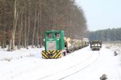 16.02.2010 - Dřevařský vlak s připojeným naším vagónem je připraven k odjezdu z výhybny Pörkölt © Jan Guzik