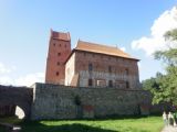 Trakai: palác hradního pána z břehu jezera. 20.8.2010 © Jiří Mazal