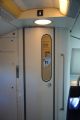18.08.2010 – budka pro telefonování u patrových vozů,vlevo od ní výtah na zavazadla a inibar © Lukáš Uhlíř