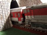 Okuliarnik 754 vo farbách ZSSK vychádza s osobnym vlakom z tunela, © Igor Jankových