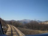 Vysoké štíty na obzoru za stanicí Malovan. 11.3.2011 © Jan Přikryl