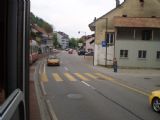 Trasování tratě Liestal- Waldenburg prostředkem ulice v obci Oberdorf. 29.4.2011 © Jan Přikryl
