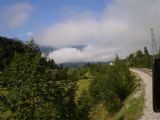 Bohinjska proga: mraky nad údolím, v němž leží Bohinjska Bistrica	3.7.2011	© Jan Přikryl