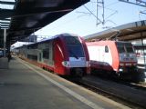 Lucemburk: typický výjev pro CFL- za patrovou jednotkou Coradia Duplex řady 2205 CFL stojí lokomotiva Traxx řady 4014 CFL	. 20.8.2011	 © Jan Přikryl