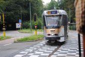 Klasická tramvaj série 7700 překračuje u zastávky Quatre Bras/Vier Armen hranice Bruselu a míří do Tervurenu	. 21.8.2011	 © Lukáš Uhlíř