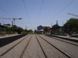 Lyon: tramvaj Alstom Citadis opouští stanici Meyzieu-Gare a míří na konečnou Meyzieu ZI	. 22.8.2011	 © Jan Přikryl