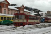 25.02.2012 - Tanvald: 810.597-5 pro Os 16211 do Harrachova na pozadí dalších vlaků © Martin Blaťák