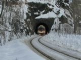 25.02.2012 - Tanvald: 854.212-8 vyjíždí ze Žďárského tunelu jako Os 16222 Harrachov - Tanvald © PhDr. Zbyněk Zlinský