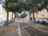Řím: vzhled tramvajové trati v ulici Viale delle Gardenie nedaleko smyčky Piazza dei Gerani je pro zdejší síť typický	4.3.2012	 © Jan Přikryl