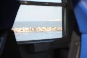 Pohled z okna vlaku na moře a anconský přístav v pozadí	7.3.2012	 © Lukáš Uhlíř