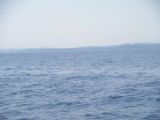 14.7.2012	Pohled z lodi na blízkou Sardínii	©	Aleš Svoboda