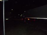 19.5.2013 - prechádzajúci kamión smerujúci do mesta vchádza na priecestie, naľavo je stanovište Polície, žel. zast. Čadca mesto, © Ing. Ján PALUCH, PhD.