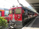 Tirano: vlak Rétskej železnice prišiel zo St. Moritzu na čele s Abe 4/4 č. 53, 30.8.2013, © Juraj Földes