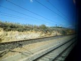 Souběh VRT a původní širokorozchodné trati ze Zaragozy před nádražím Lleida Pirineus/Lérida Pirineos	24.4.2013	 © 	Jan Přikryl