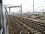 Milano: souprava sedmi vozů typu MDVC s lokomotivou řady E464 Trenord na konci projíždí jako vlak RV do Tirana zhlavím stanice Centrale	26.4.2013	 © 	Jan Přikryl