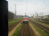 Lokomotiva řady 1144 ÖBB stojí po odvěšení od soupravy vlaku EN Wiener Walzer v kolejišti stanice Wien-Hütteldorf	27.4.2013	 © 	Jan Přikryl