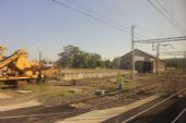 11.06.2014 - Flaçà: už nevyužívané skladiště s rampou (foto z vlaku) © PhDr. Zbyněk Zlinský