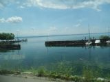 Neuchâtel: jachtový přístav na jezeře Lac de Neuchâtel pohledem z tramvaje mezi zastávkami Evole a Champ-Bougin, 25.6.2014 © Jan Přikryl