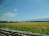 Pohled na Ženevské jezero a masiv savojských Alp z vlaku, stojícího ve stanici Givrins, 26.6.2014 © Jan Přikryl