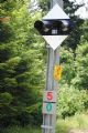 Signalizace na zastávce na znamení La Chèvrerie-Monteret ukazuje strojvedoucímu, jestli zastavit má či nemá, 26.6.2014 © Lukáš Uhlíř