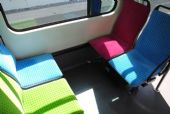 Lausanne: různobarevná sedadla v jednotce metra řady Bem 4/6, 26.6.2014 © Lukáš Uhlíř 