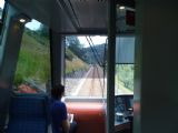 Vlak z Domodossoly do Locarna se blíží do švýcarské pohraniční stanice Camedo, 27.6.2014 © Jan Přikryl